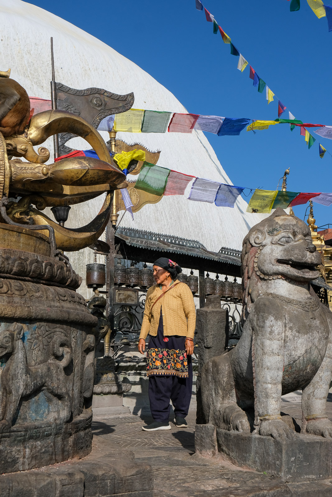 Lady in front of stupa=