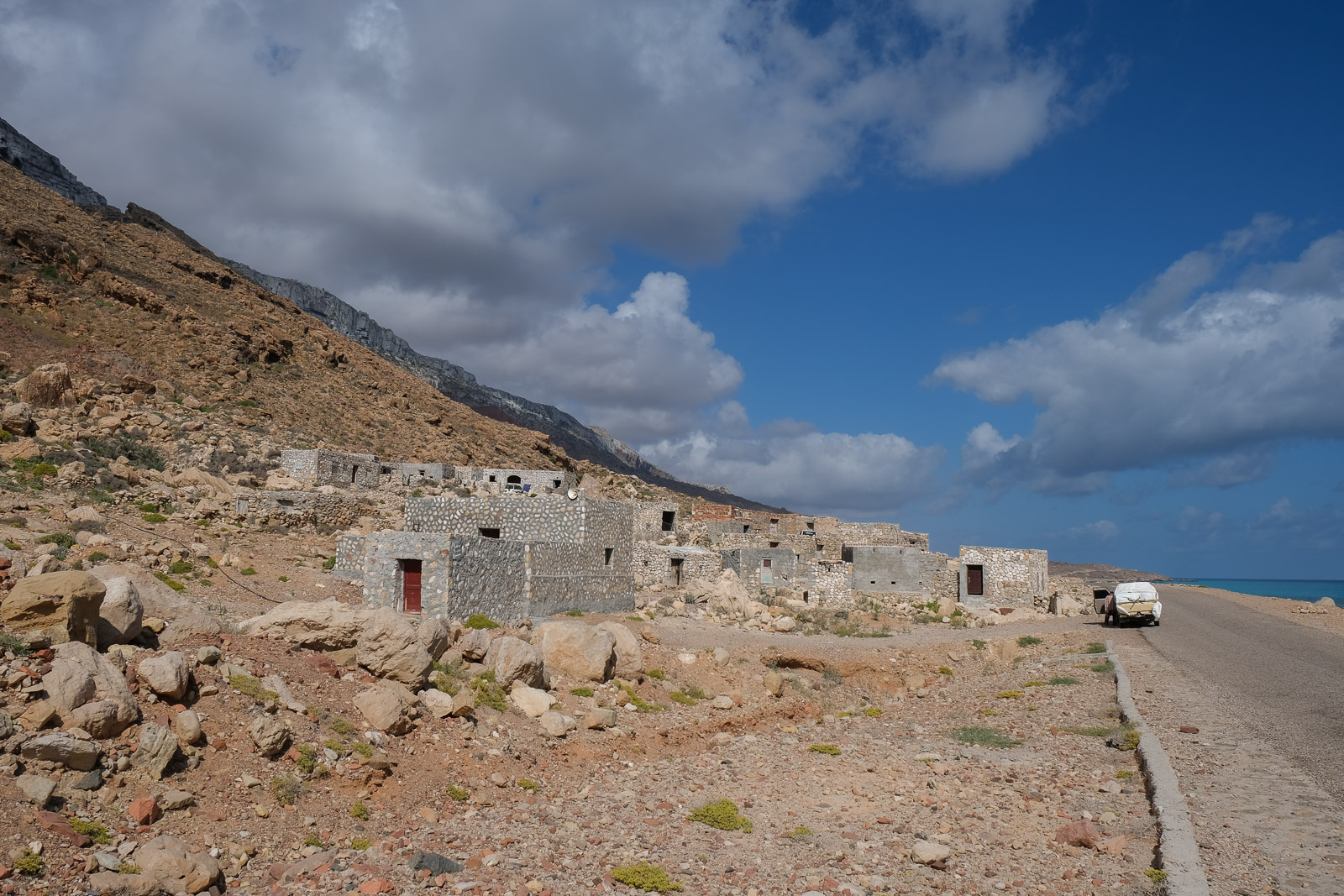 Road with stone houses=